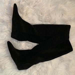 Tall black suede boots